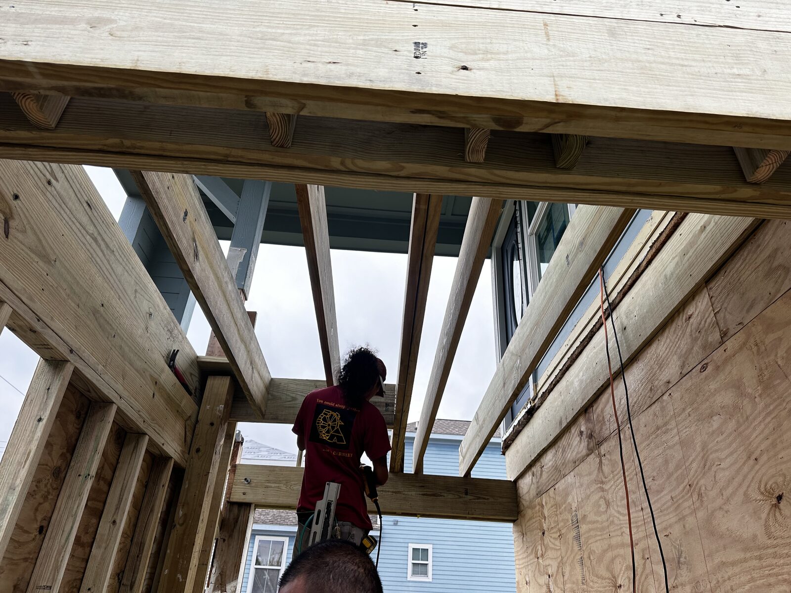 Heavy timber beams and joists braced overhead