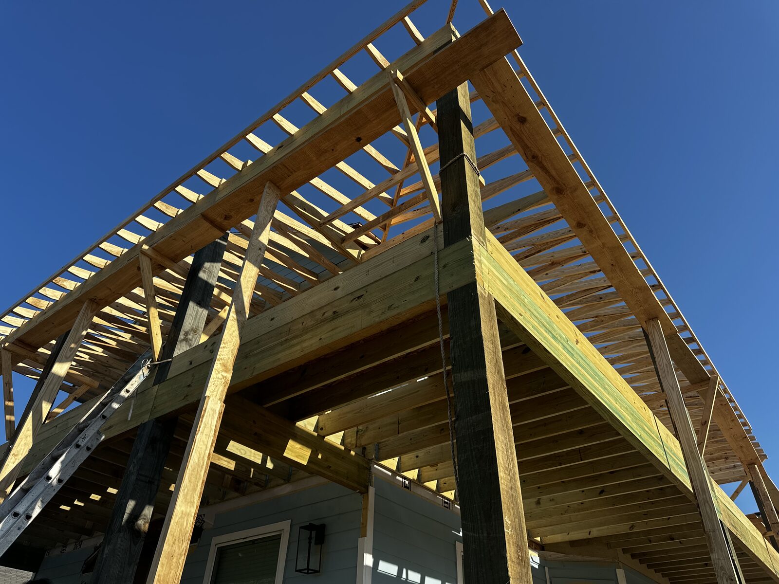 Sand Star residential framing — timber roof trusses under construction